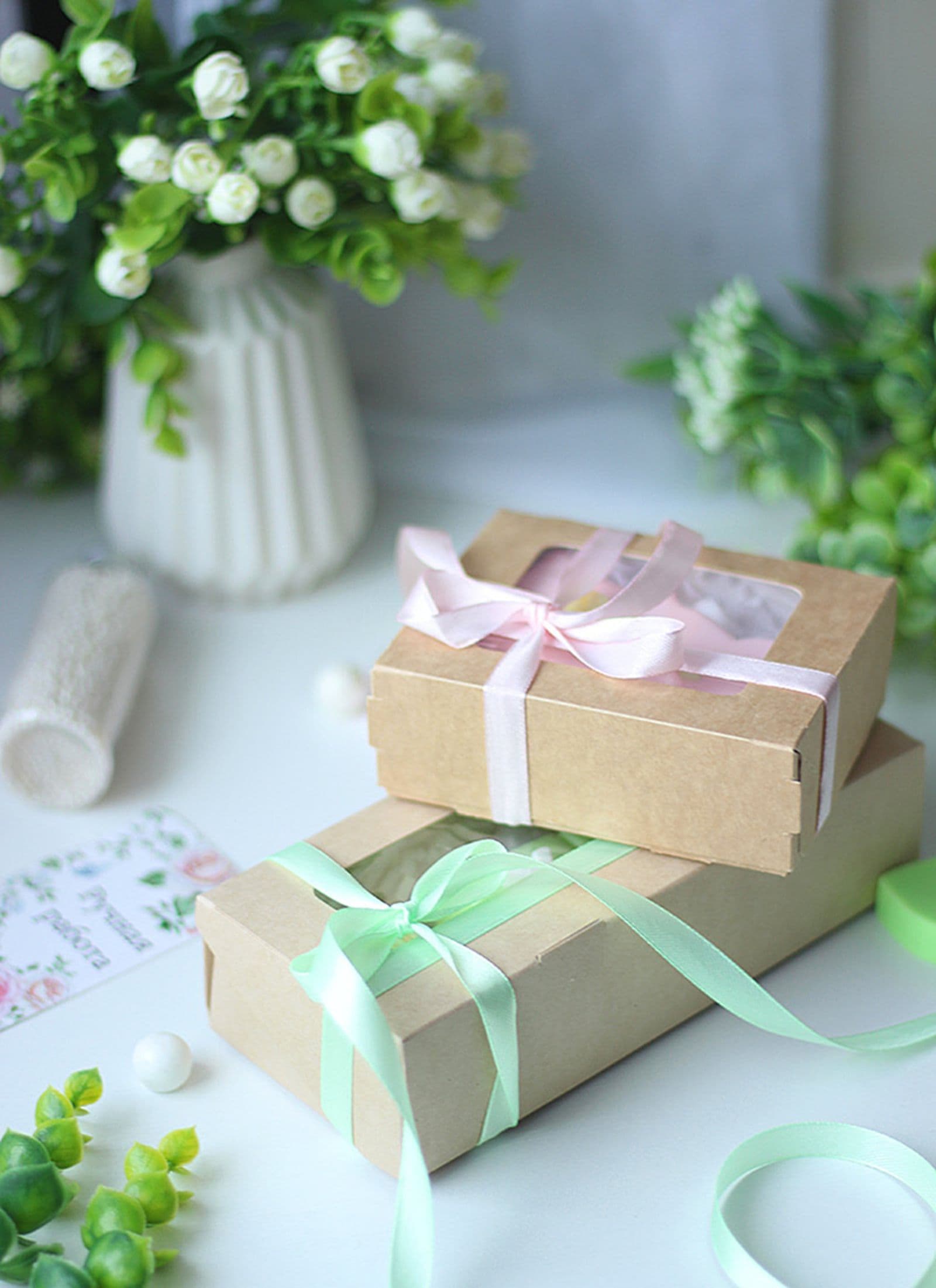 Gift wrapped in kraft paper and ribbon